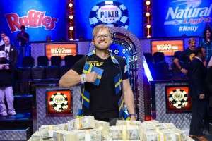 2014 WSOP Champion Martin Jacobson with his bracelet and $10 million in cash