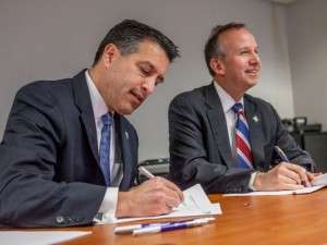 Nevada Governor Brian Sandoval and Delaware Governor Jack Markell Sign the Multi-State Internet Gaming Agreement Photo: Robert Craig, The (Wilmington, Del.) News Journal